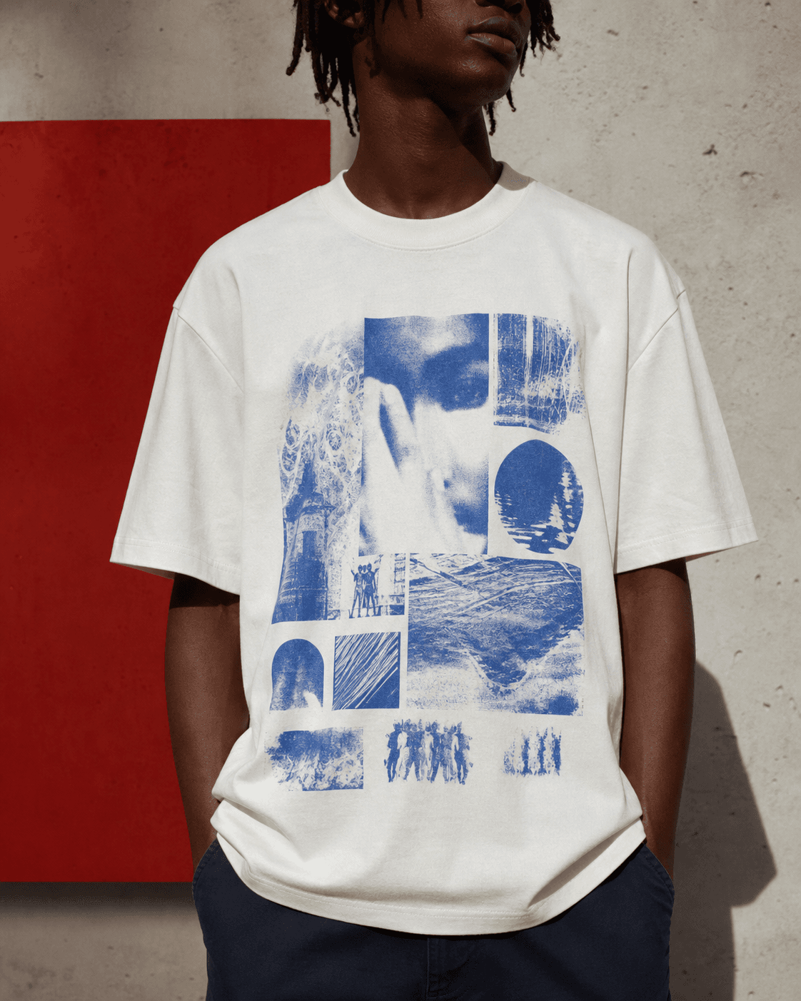 Demo model in a bone-white heavyweight T-shirt with an abstract blue collage print